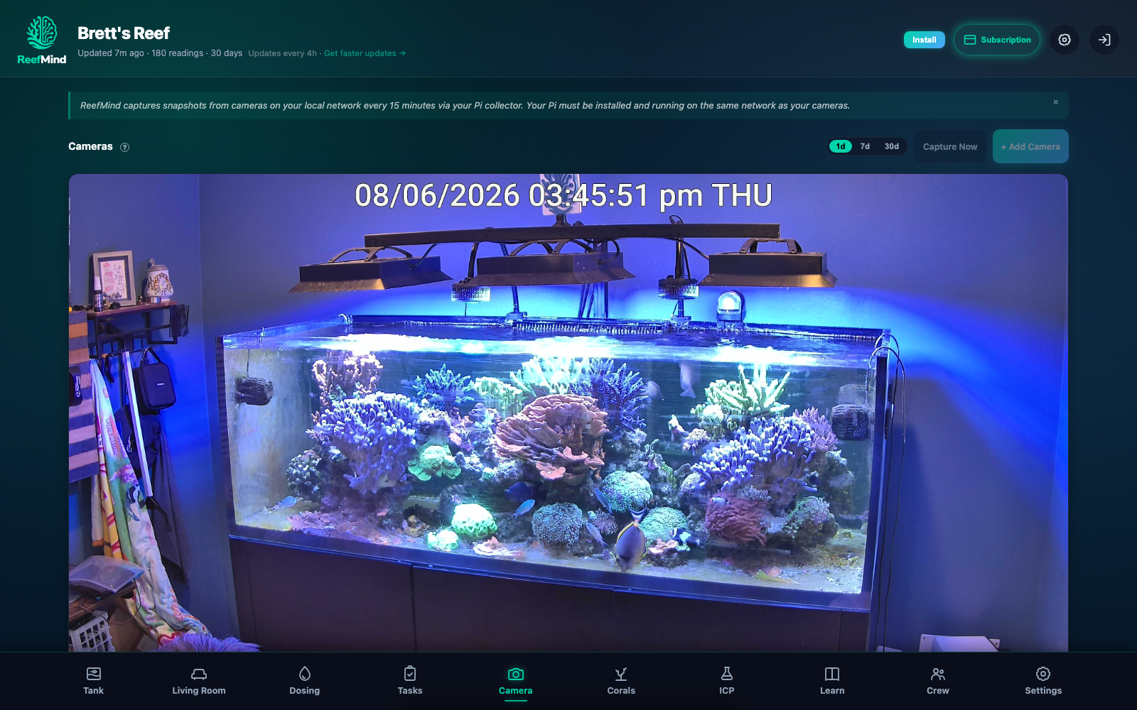 Full ReefMind production demo on the Camera tab, with a large real reef view and camera history controls